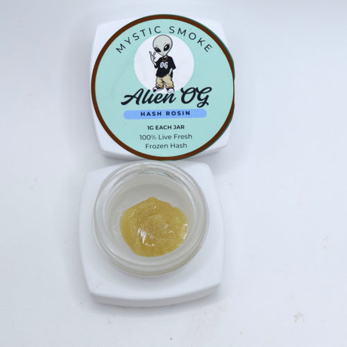 Alien OG S-Tier fresh frozen hash rosin featuring creamy off-white cold cure with a glossy terpene-rich finish and classic OG profile.