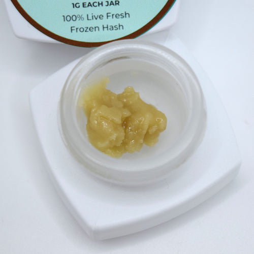 Alien OG S-Tier fresh frozen hash rosin featuring creamy off-white cold cure with a glossy terpene-rich finish and classic OG profile.