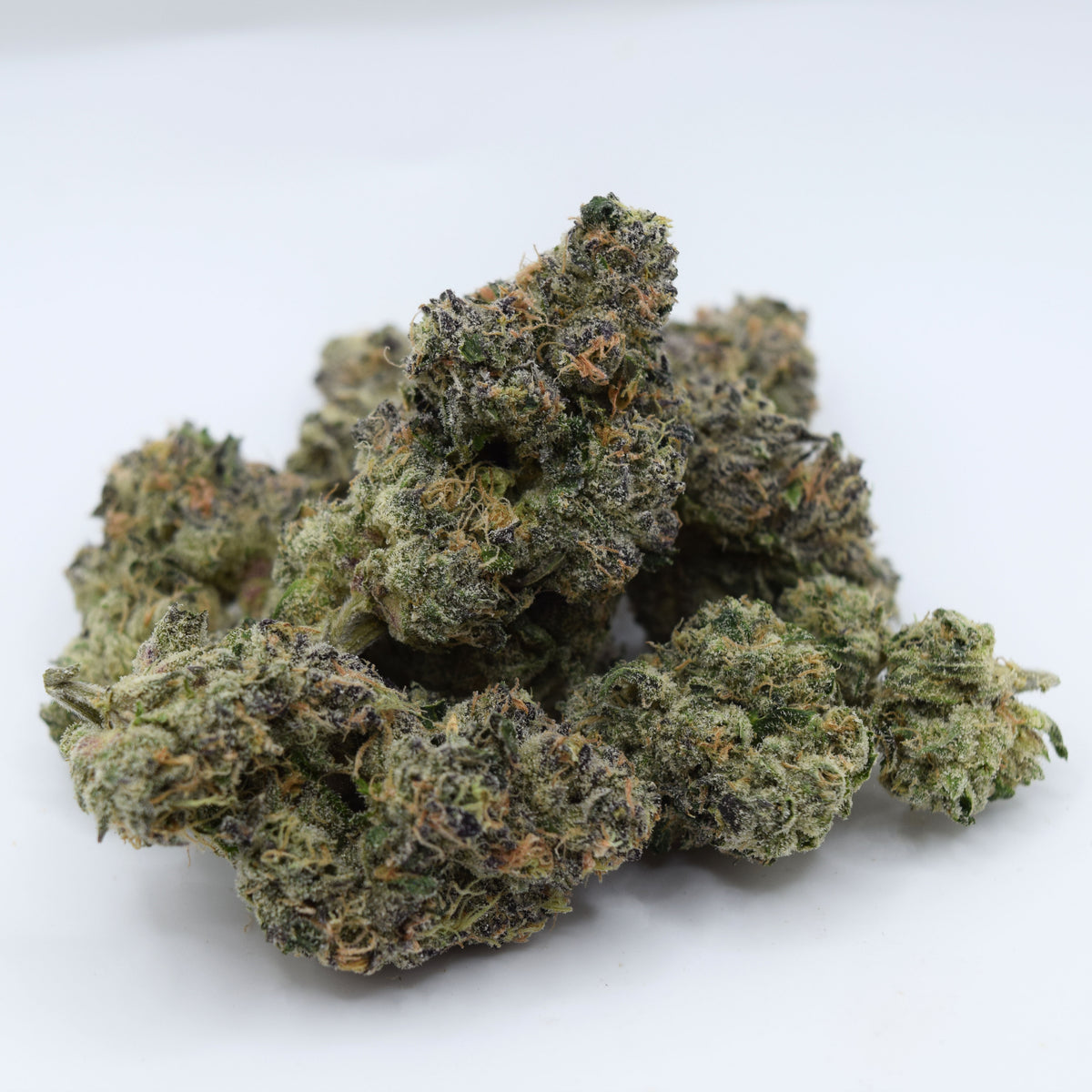 Blue Zushi Craft THCa flower with dense blue-purple frosted buds and a tropical candy, berry, citrus, mint, cream, and gas aroma profile.