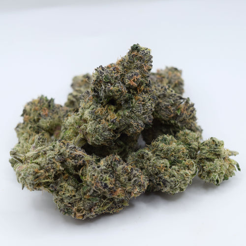 Blue Zushi Craft THCa flower with dense blue-purple frosted buds and a tropical candy, berry, citrus, mint, cream, and gas aroma profile.