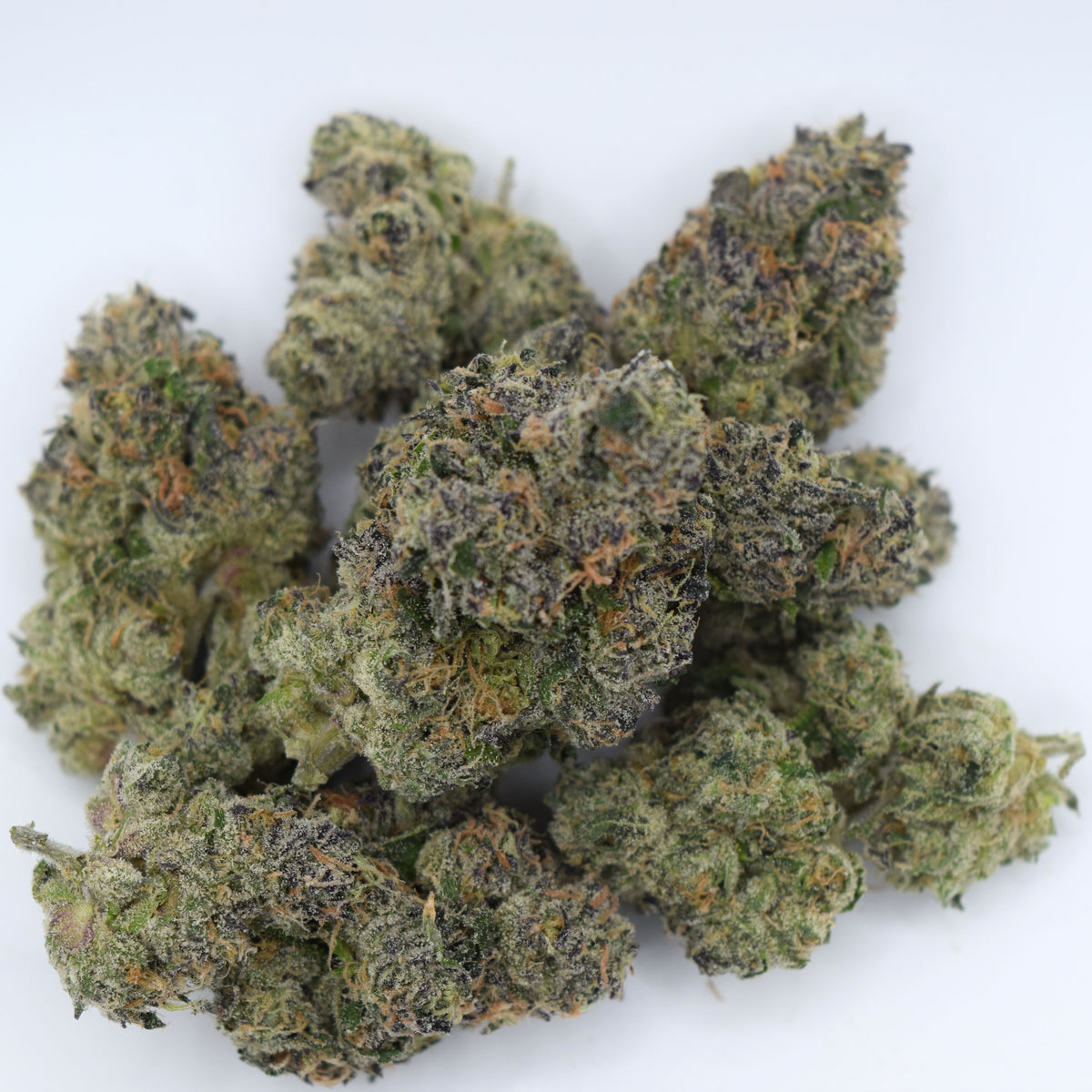 Blue Zushi Craft THCa flower with dense blue-purple frosted buds and a tropical candy, berry, citrus, mint, cream, and gas aroma profile.