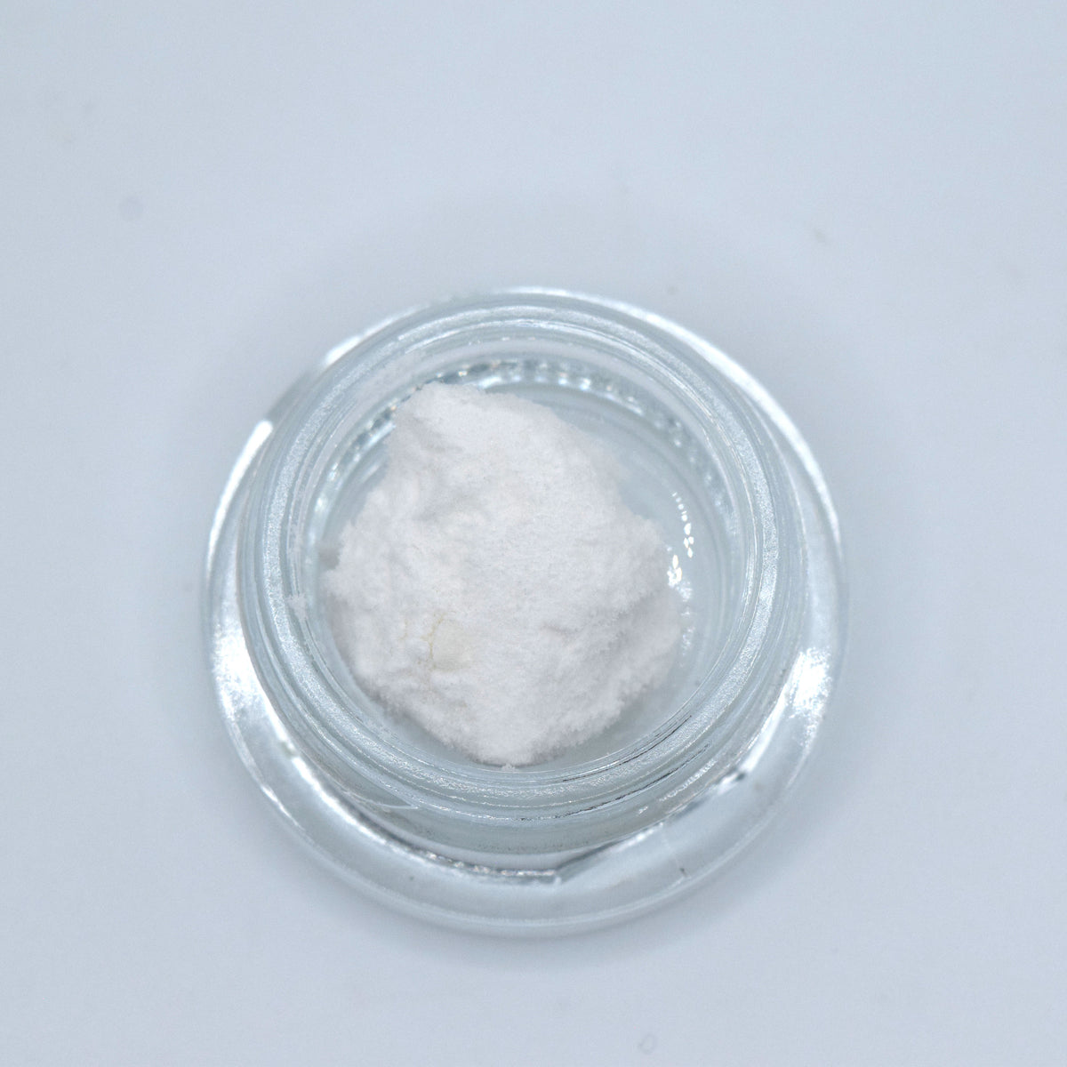 CBD Isolate featuring a fine white crystalline cannabidiol powder for cannabinoid formulations.