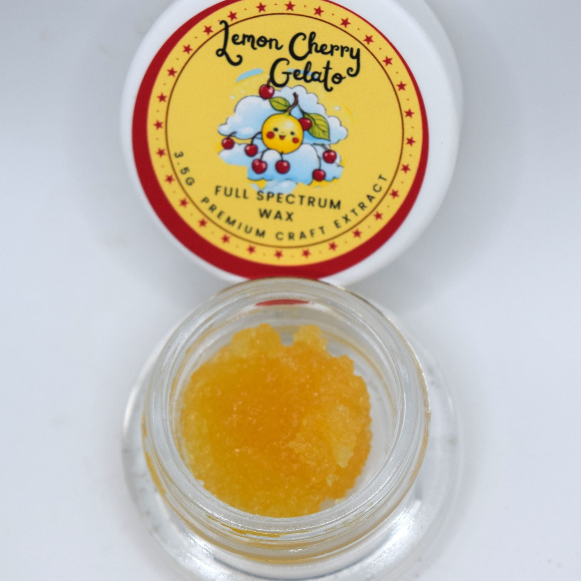 LCG Lemon Cherry Gelato THCa sugar full spectrum extract showing golden crystals with terpene-rich sauce.