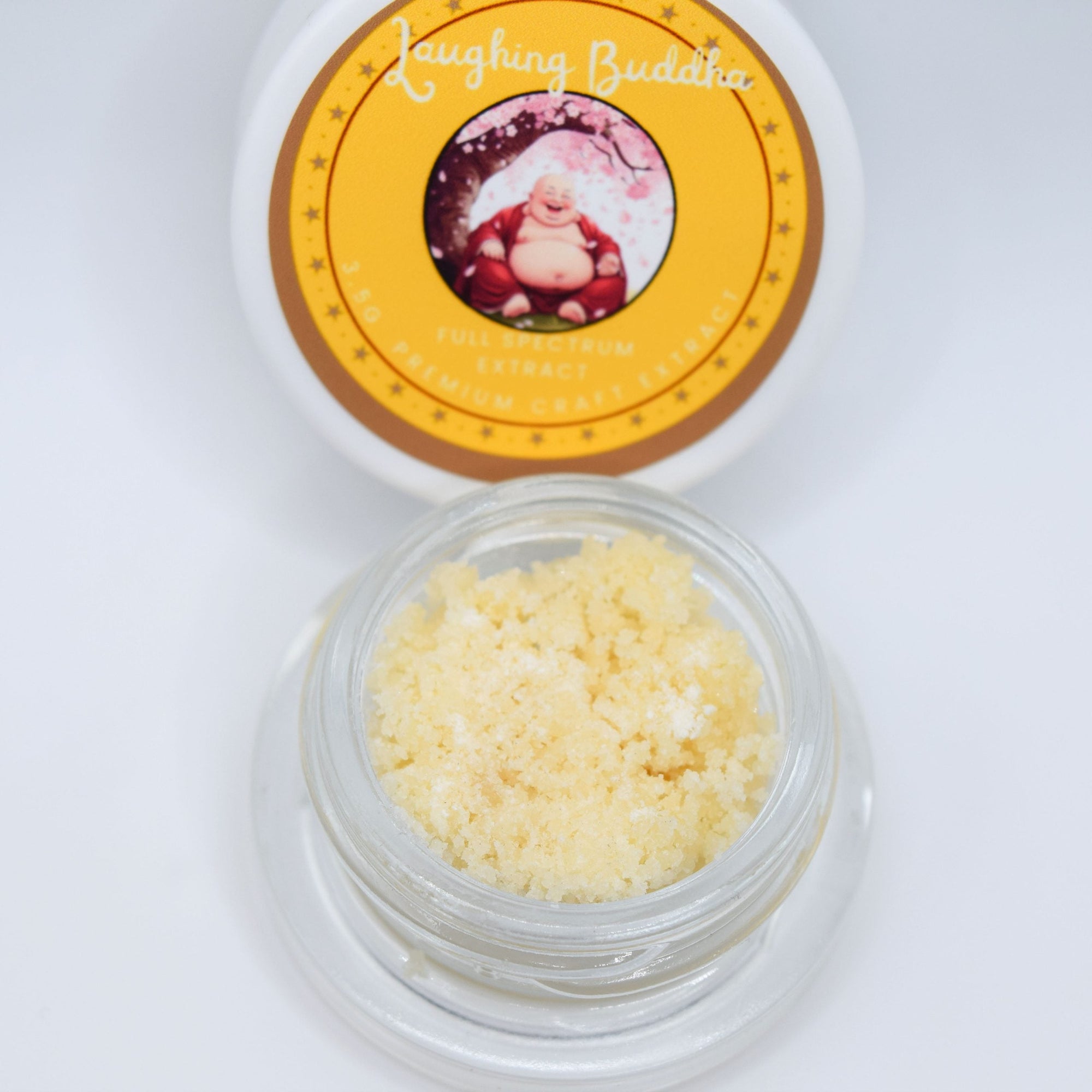 Laughing Buddha THCa FSE crumble with golden extract texture and tropical citrus herbal aroma profile.
