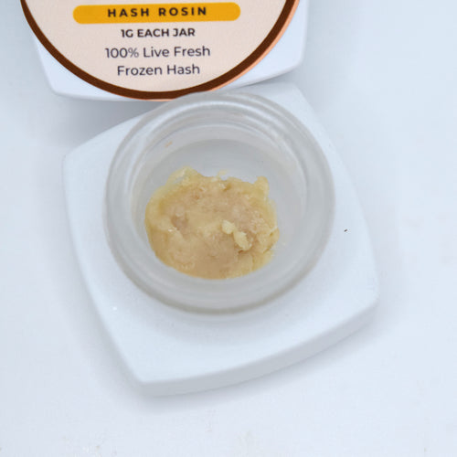 Moroccan Peaches A+ fresh frozen hash rosin featuring a pale, slightly drier cold-cure texture with terpene-rich peach and citrus character.
