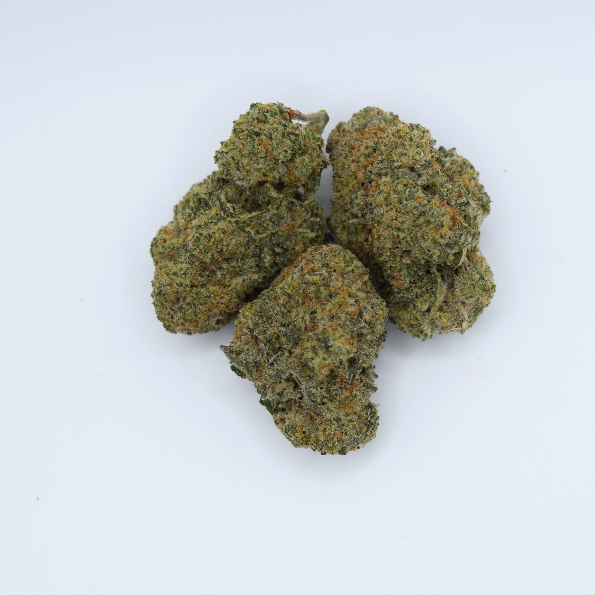 MAC 1 Exotic THCa flower with dense frosted buds and a creamy citrus, floral, pine, earthy, and funky resin aroma profile.