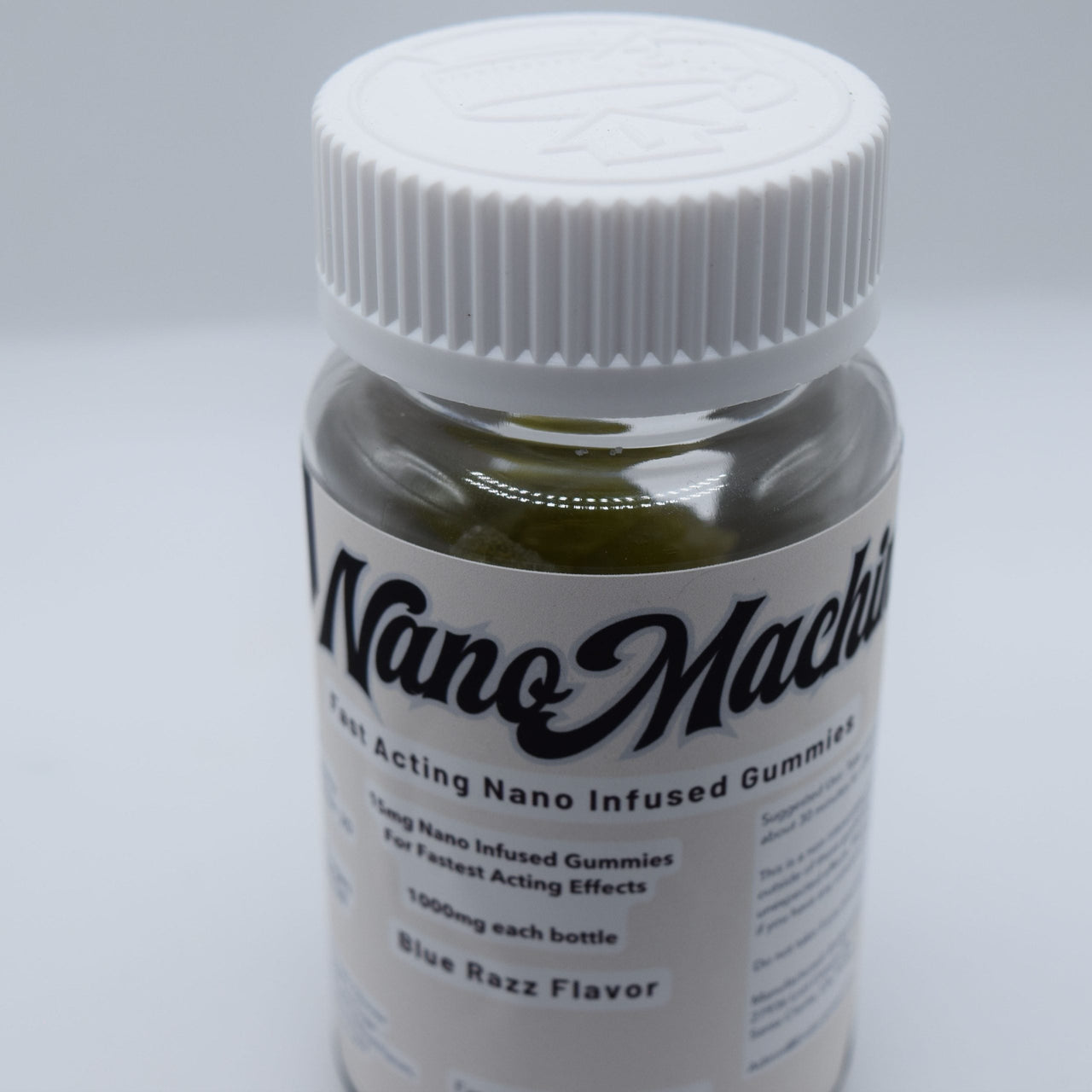 Nanomachine 15mg nano Delta-9 gummy in a bright blue raspberry flavor with sweet berry candy, tart citrus, and sour sugar notes.