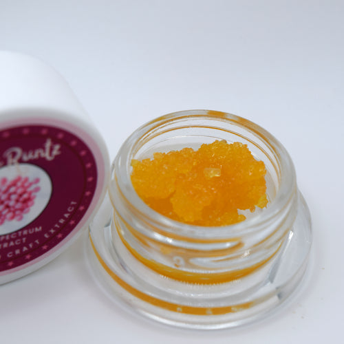 Pink Runtz THCa Full Spectrum Extract with golden resinous texture and floral rose, berry, cherry, tropical fruit, cream, and sour candy aroma.