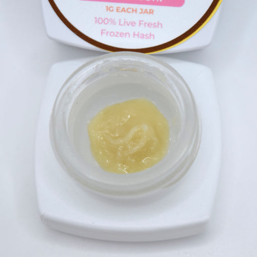 Spritzer S-Tier fresh frozen hash rosin featuring creamy off-white cold cure with a glossy terpene-rich finish.