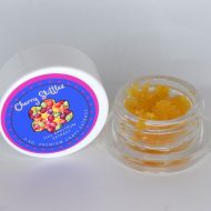 Cherry Skittlez THCa sugar full spectrum extract with golden crystals and terpene-rich sauce.