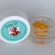Gelato 33 THCa full spectrum extract showing creamy terpene sauce with fine sugar crystalline texture.