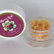 Sweetberry Kush THCa full spectrum extract showing berry-toned terpene sauce with caviar sugar crystalline texture.