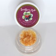 Sweetberry Kush THCa full spectrum extract showing berry-toned terpene sauce with caviar sugar crystalline texture.