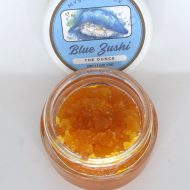 Bulk THCa live resin full spectrum extract showing large quantity of terpene-rich sauce or sugar in container.
