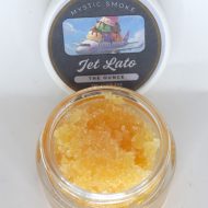 Bulk THCa live resin full spectrum extract showing large quantity of terpene-rich sauce or sugar in container.