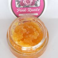 Bulk THCa live resin full spectrum extract showing large quantity of terpene-rich sauce or sugar in container.