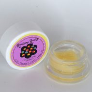 Rainbow Runtz THCa full spectrum extract badder showing creamy whipped concentrate texture with pale gold color.