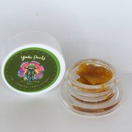 Yoda Pants THCa full spectrum extract showing amber terpene sauce with crystalline THCa structure and resin depth.