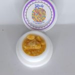 Zruntz THCa crumble full spectrum extract showing light gold granular texture with candy fruit terpene profile.