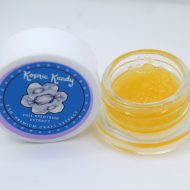 Golden Cosmic Candy live THCa sugar with visible crystals and terpene sauce.