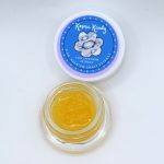 Golden Cosmic Candy live THCa sugar with visible crystals and terpene sauce.