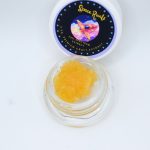 Space Runtz THCa live resin with golden terpene-rich extract and sweet candy fruit aroma profile.